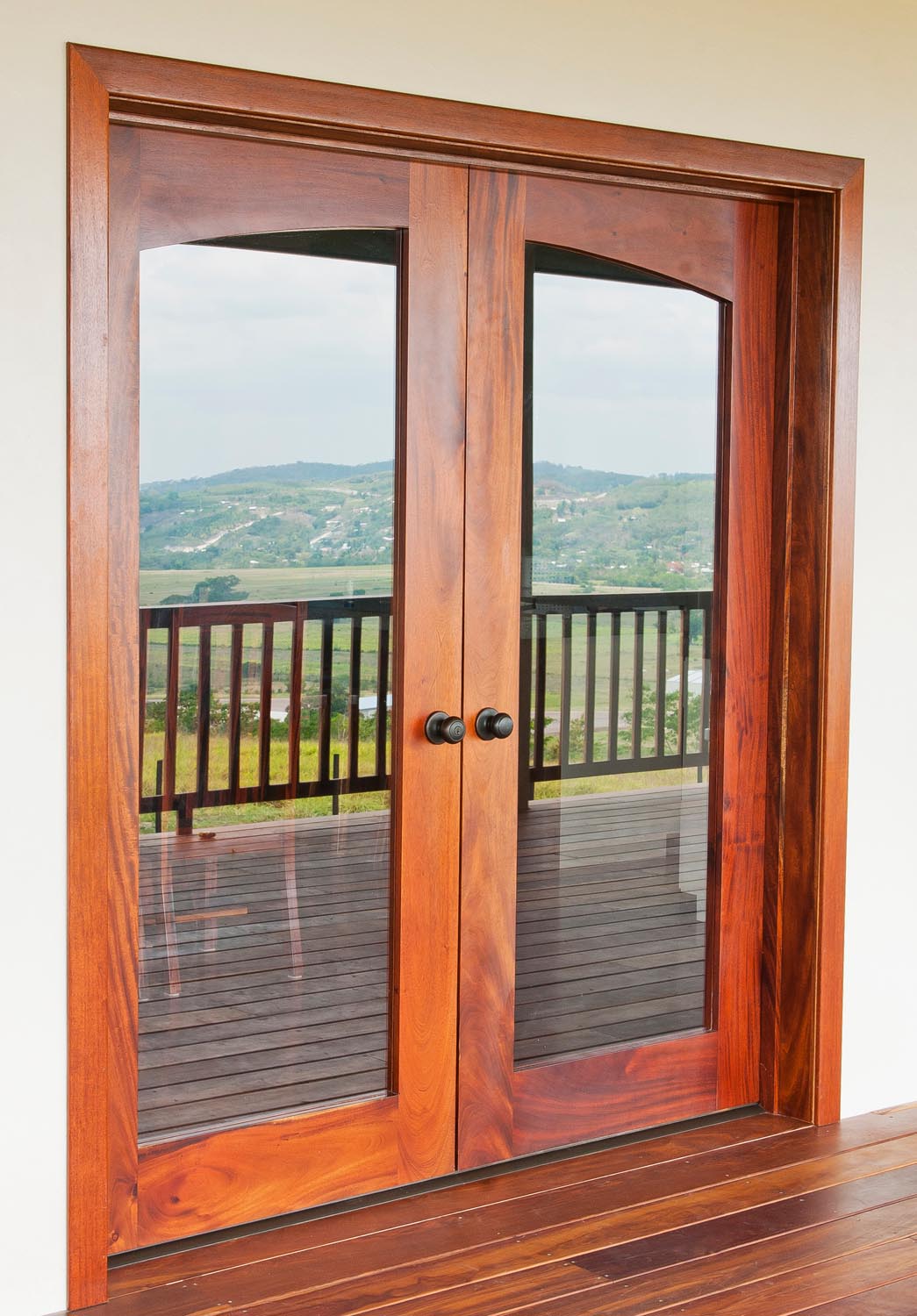 Full glass panel arch top mahogany french door