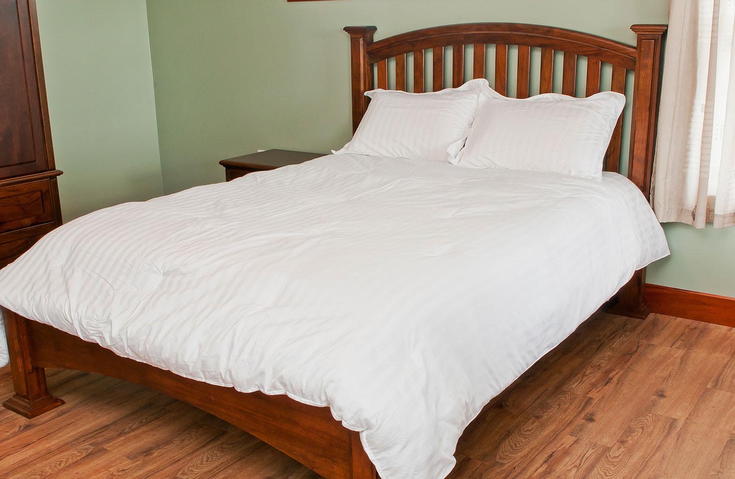 Custom figured mahogany queen bed