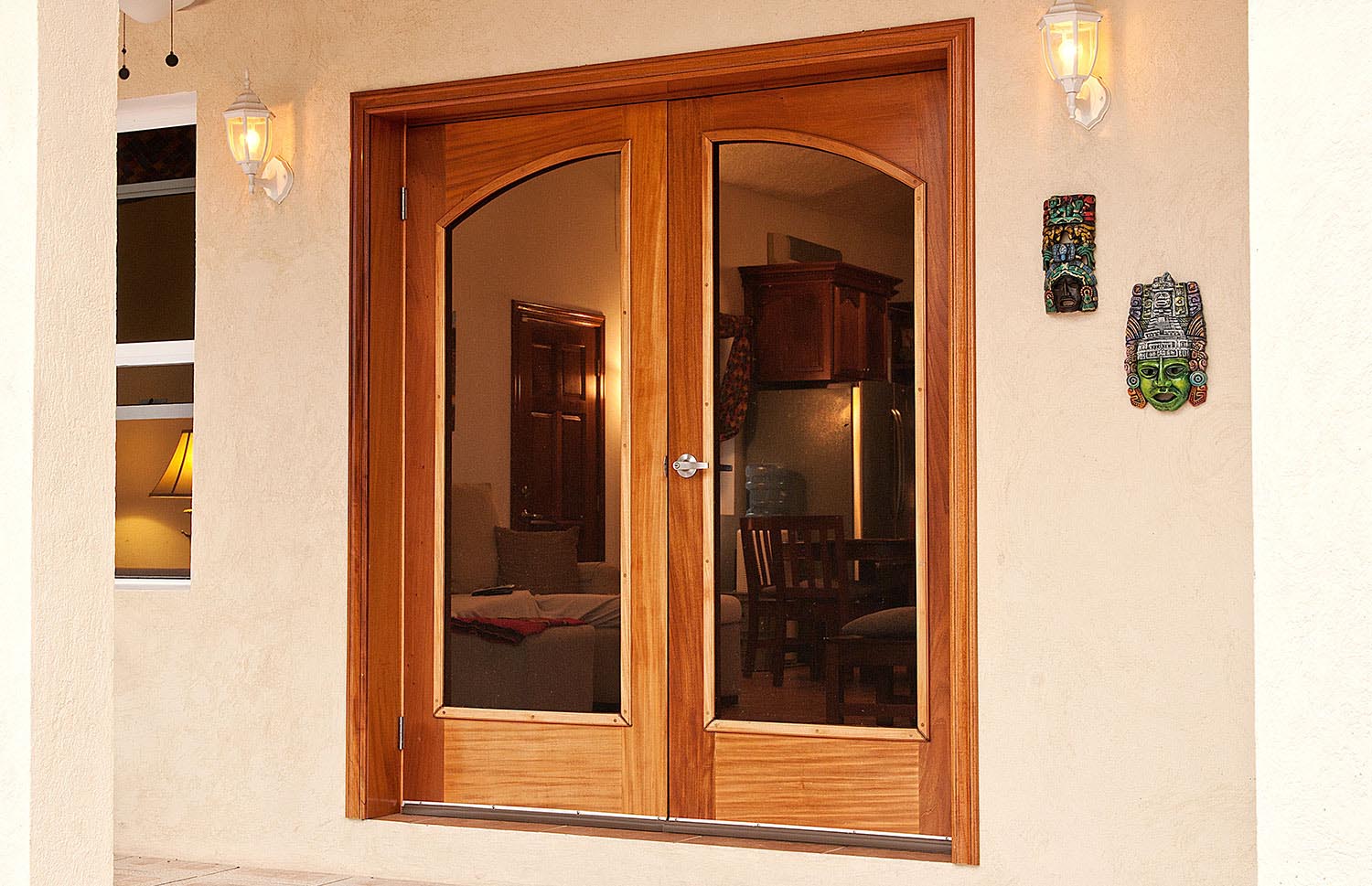 Arch top, full glass panel french door, figured mahogany