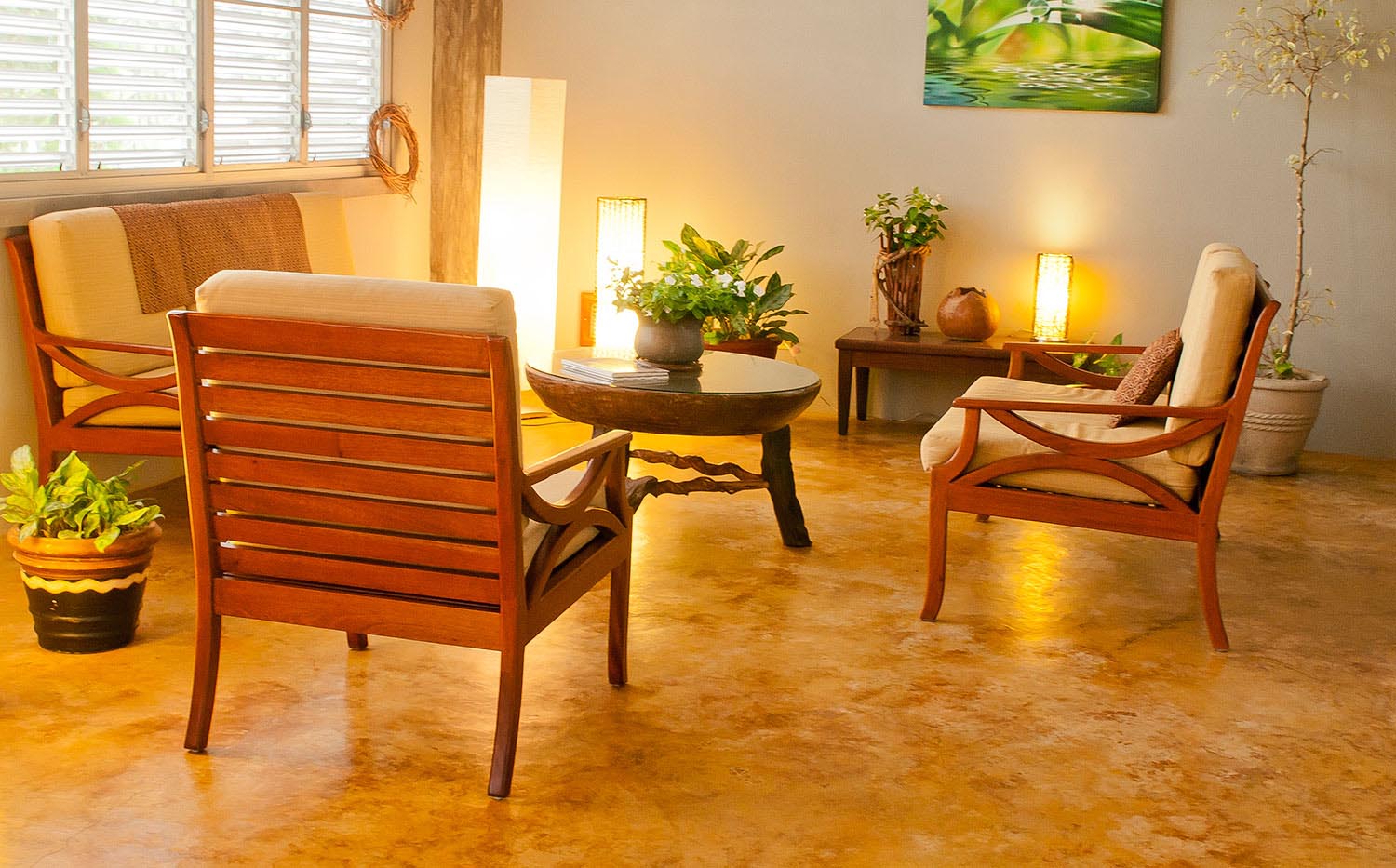 Mahogany lounge chairs with cushions