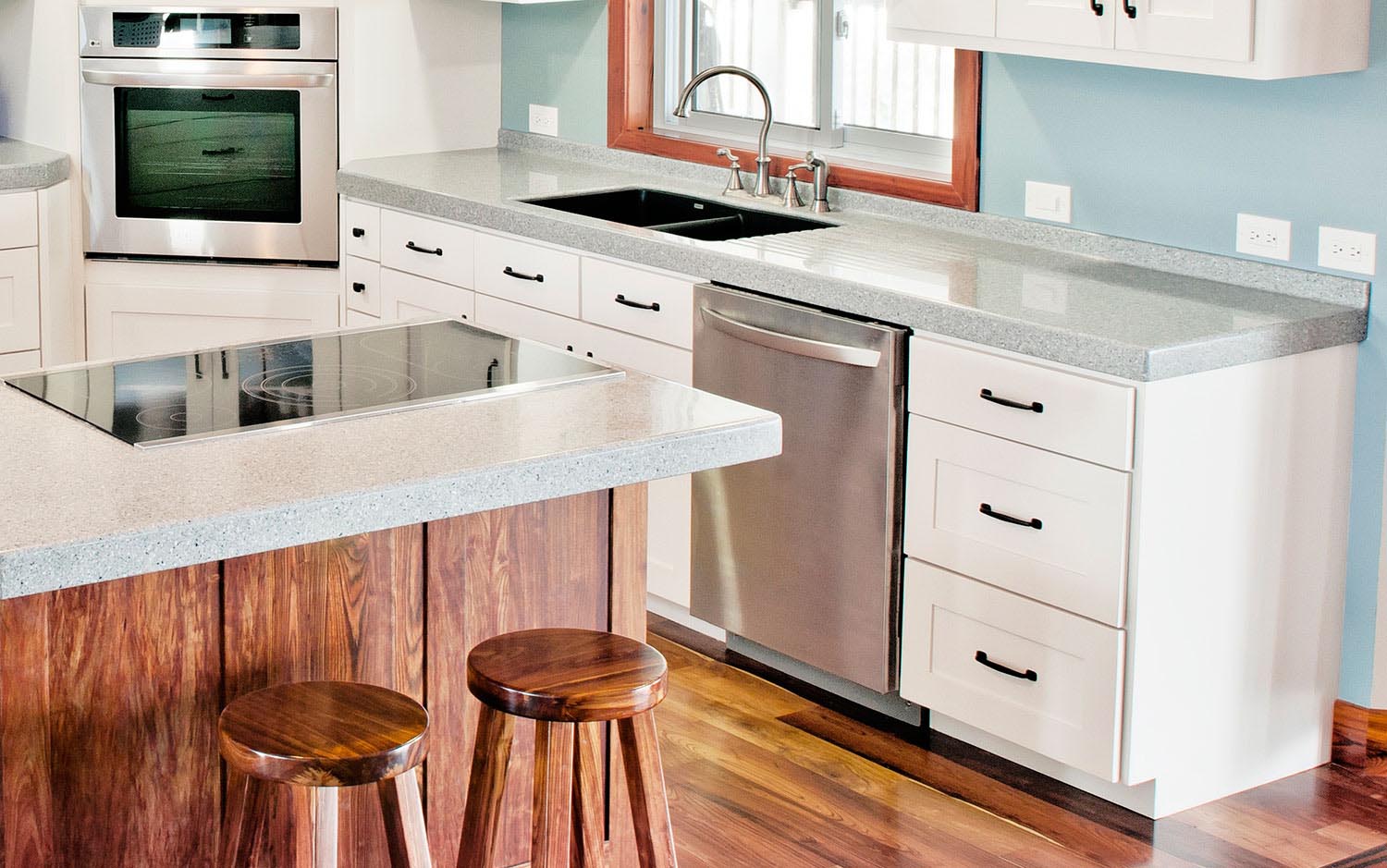 Kitchen cabinets, countertop, stools